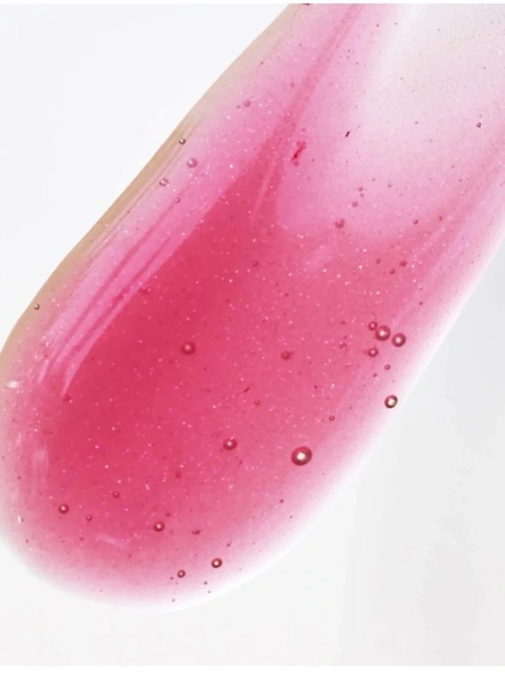 LALICIOUS Hydrating Butter Gloss SPF 30 in Berry Bomb shine shield plump hydrate